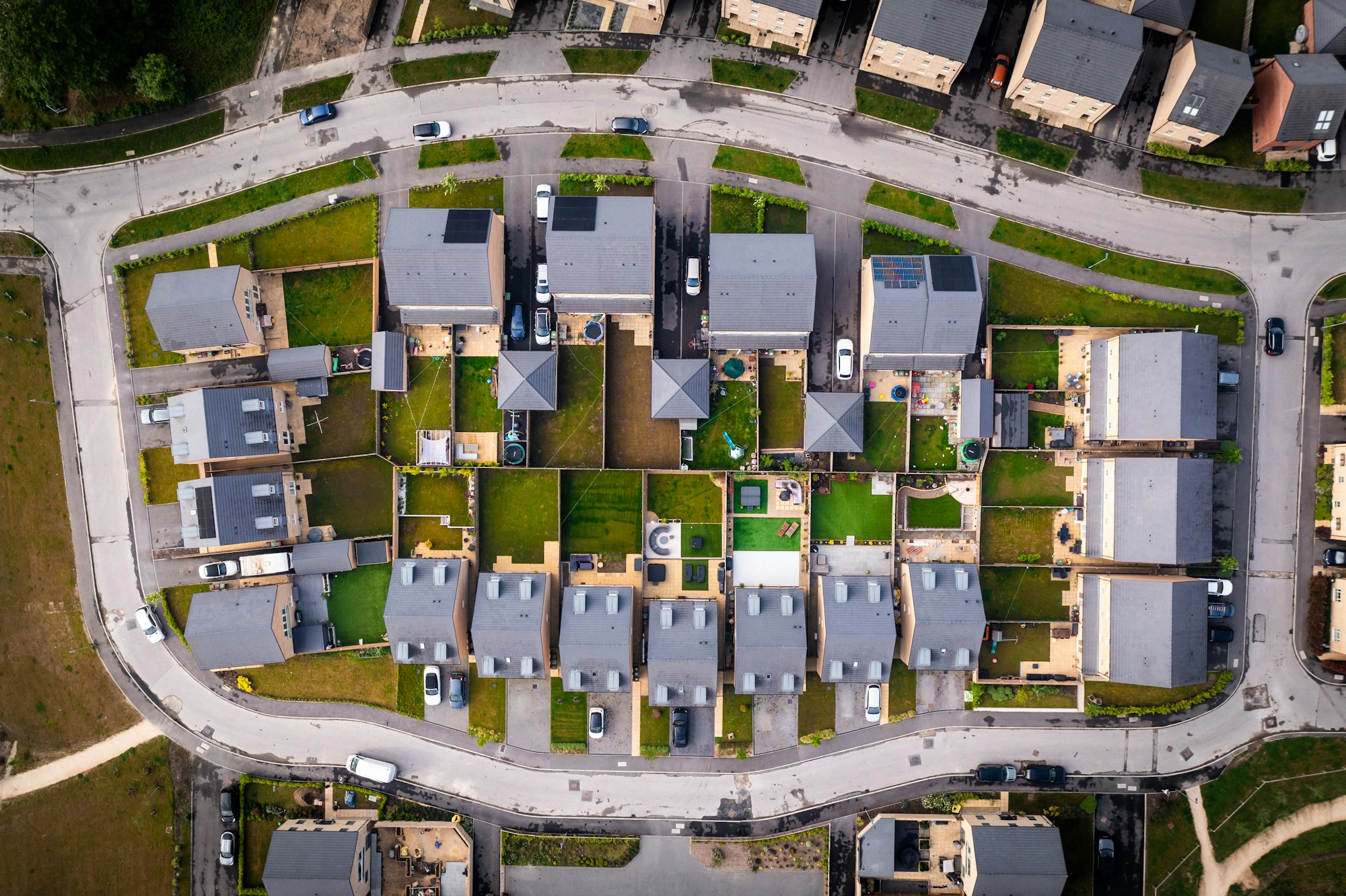 Aerial view directly above a new build housing estate in the UK